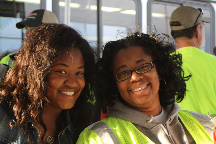 Jolene Taylor (right) takes a break from her judging duties at the annual Roadeo bus driving competition.