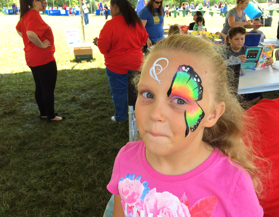 Face painting at Library in the Park