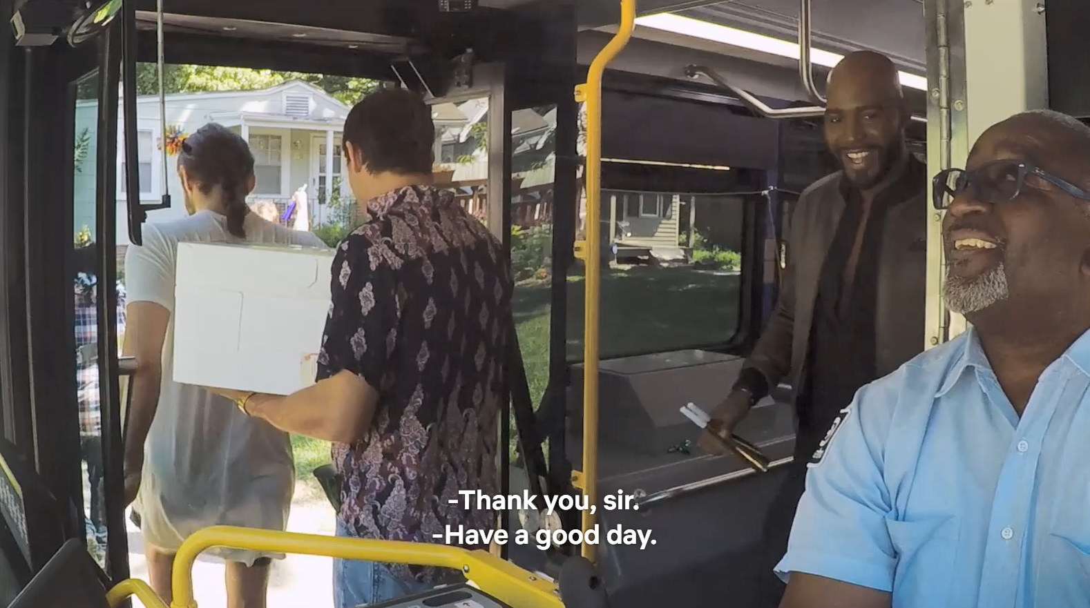 Queer Eye star Karamo thanks bus driver Fred Ersery as Karamo exits the RideKC bus. 
